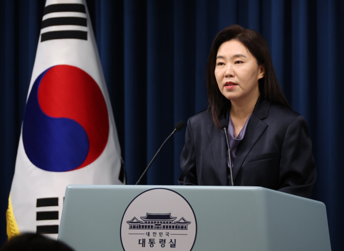 Presidential spokeswoman Kang Yu-jung briefs the press on President Lee's upcoming visit to Japan