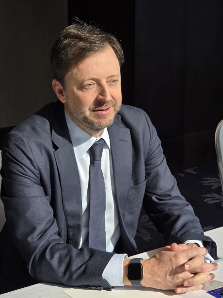 James King, head of Structured Finance Portfolio Management at M&G Investments, speaks with a reporter from The Korea Economic Daily in Seoul in March 2026 